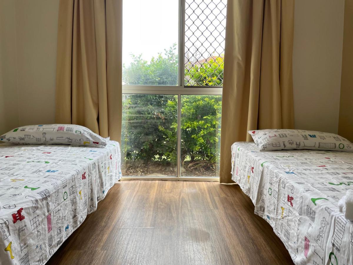 Theme Parks Amituofo Homestay Gold Coast Exterior photo
